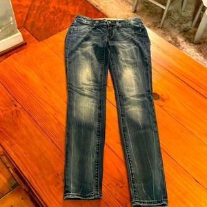 Size 2 Rerock mid rise dark wash blue denim jean leggings.